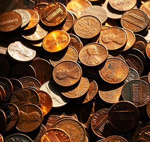 A pile of pennies. Links to What to Give
