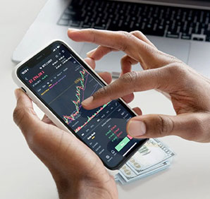 Someone looking at stocks on their phone. Links to Closely Held Business Stock