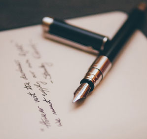 A pen on paper. Links to Gifts by Will